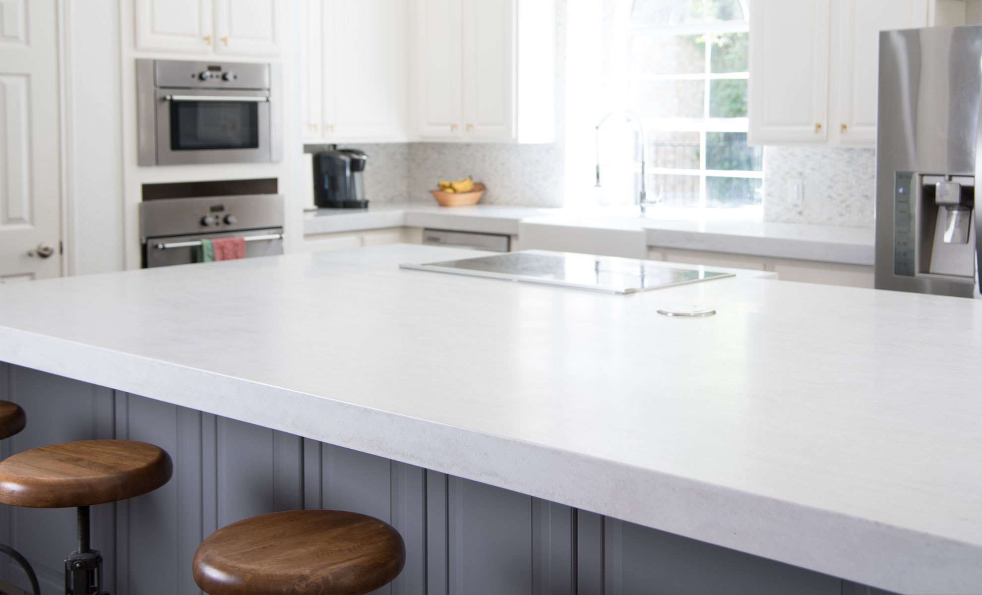 Modern kitchen island with solid surface countertop